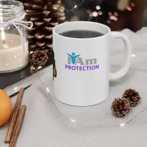 Protective firefighter-themed ceramic mug with "I Am Protection" logo, ideal for coffee or tea.